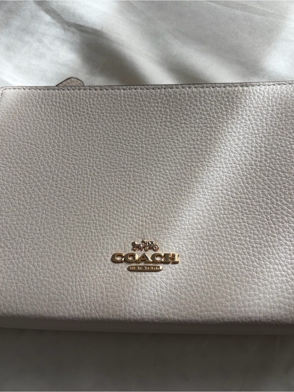 Coach Pebbled Leather Wristlet in Light Cream with Gold Logo